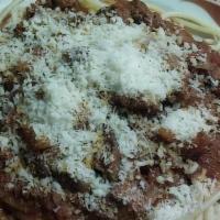 Spaghetti Con Fegatini Di Pollo · Chicken livers are sautéed with onions and wine then finished with meat sauce.
