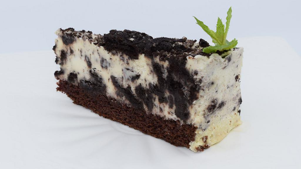 Oreo Cheesecake · Rich New York cheesecake topped with crushed OREO cookies to create a decadent and indulgent dessert.