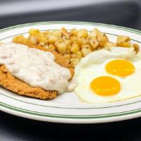 Chicken Fried Steak · Half Lb tender steak that has been breaded and fried to a golden brown and topped off with o...