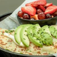 The Hung-A-Ry Crepe · Smoked bacon, lettuce, Roma tomatoes, fresh avocado, melted Swiss, finished with a light may...