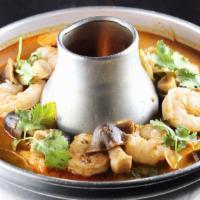 Tom Yum Shrimp · Thai spicy and sour soup with lemongrass, lime juice, mushroom and shrimp.