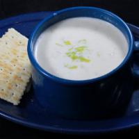 House Clam Chowder · New England style creamy clam chowder is made from scratch with clams, celery, onion and whi...