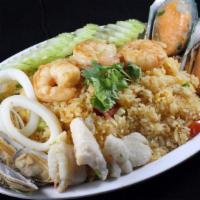 Seafood Fried Rice · With crab, shrimp, calamari, mussel and fish fillet.