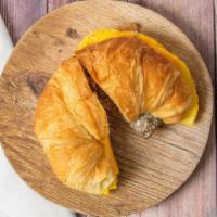 Breakfast Croissant · Fresh buttery flaky croissant to wake up your pallet. Egg and cheese with your choice of ham...