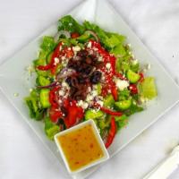 Greek Salad · Lettuce, tomatoes, red onions, bell pepper, and cucumbers tossed with our house Greek salad ...