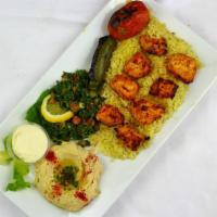 Chicken Kebab Plate · Chicken breast skewered and charbroiled to perfection, served with rice, hummus, tabbouleh, ...