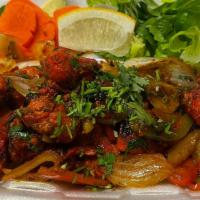 Chicken Tikka · Boneless (white meat) chicken pieces marinated in herbs and spices.