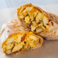 Supreme Breakfast Burrito · With eggs bacon ham chorizo potatoes cheese and sour cream.