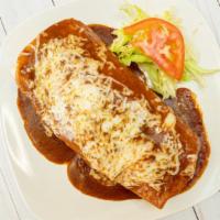 Burrito Banado · 12 inch flour tortilla filled with your choice of  meat,  refried beans, rice, cheese and sm...