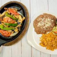 Fajitas With Tortillas · Steak or chicken. Served with guacamole and sour cream.