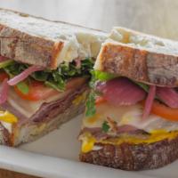 The Classic Sandwich · Your Choice of Meat with Green Leaf, Arugula, Tomatoes, Pickled Red Onions, Mayo, Mustard, a...