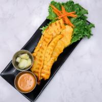 Chicken Satay  · Grilled marinated chicken on skewer, served with peanut sauce and cucumber sauce.(5 Pieces)