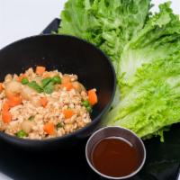 Lettuce Wrap · Sauteed minced chicken with pea and carrot and chestnut in homemade brown sauce.