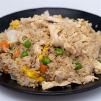 Thai Fried Rice · Thai style fried. Pan fried jasmine rice with your choice of meat, egg,  pea and carrot, oni...