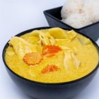 Yellow Curry · Simmered in yellow curry paste in coconut milk with, carrot, potato and onion. Add duck, chi...
