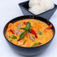 Phanang Curry · Simmered in red phanang curry paste in coconut milk with pea and carrot, bell pepper and kaf...