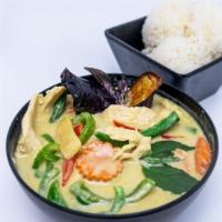 Green Curry · Simmered green curry paste in coconut milk with eggplants, bamboo shoot, green bean and pea ...