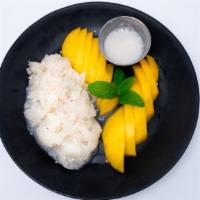 Mango Sticky Rice  · Mango sticky rice Thai dessert made with sticky rice, fresh mango and topped with coconut mi...