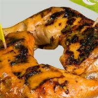 Half Chicken - Dark · 2 Dark quarter meat pieces. 'Flame Grilled' with your choice of peri peri flavor.