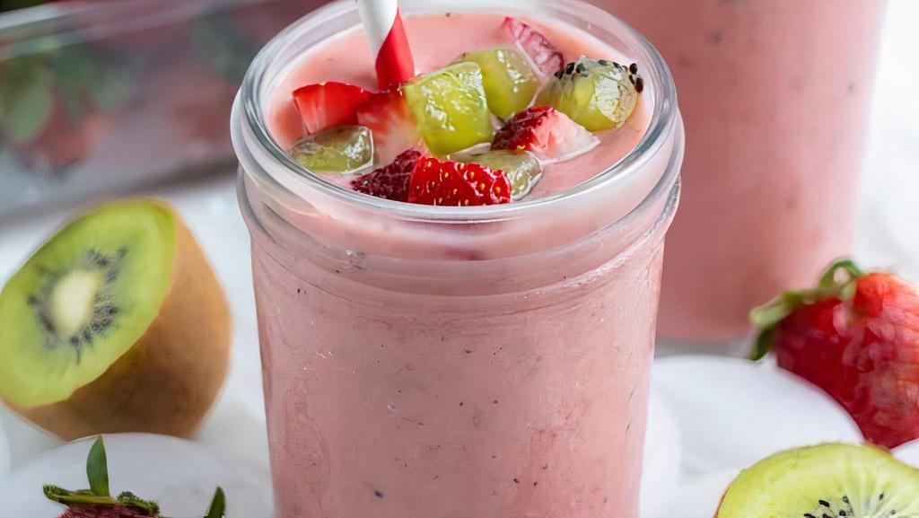 Straw Kiwi Smoothie · Strawberry and kiwi blended with organic coconut water and sweetened with organic agave nectar.