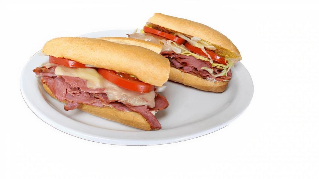 Pastrami Sandwich (Regular) · Served with steak fries or house salad. Pastrami,, tomatoes, red onions, provolone cheese & mustard.