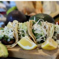 Tacos · Corn tortillas with your choice of meat, onions, cilantro and salsa.