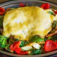 Veggie Hash · Spinach, mushrooms, broccoli, zucchini, tomatoes, carrots, mix bell peppers, two eggs, toppe...