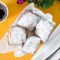 Traditional Beignets (2) · With lots of powder sugar.