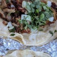 1 Soft Taco · Choice of Pastor or Carnitas, topped with cilantro, onions.