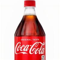 Coke Classic 1L · Crisp and delicious soft drink best enjoyed cold.