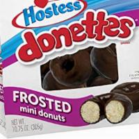 Hostess Donettes Chocolate Bag 10.75Oz · Round and round they go, right into your heart. Get a sweet start with Hostess Donettes. The...