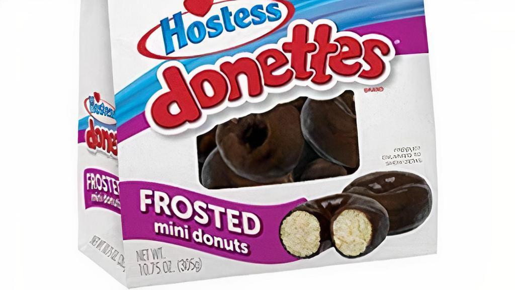 Hostess Donettes Chocolate Bag 10.75Oz · Round and round they go, right into your heart. Get a sweet start with Hostess Donettes. These mini bakery treats are made to perfection and covered with yummy chocolate. Simply pop open a bag, and reach your hand into a land of goodness. Resealable bag for in between your snack trips. Donettes® make the perfect treat any time of day.