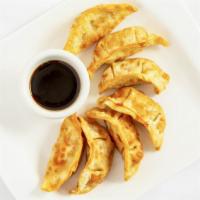 Potstickers (7) · Steamed delicious rice pockets stuffed with ground chicken, herbs and spices served with our...