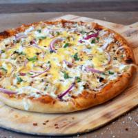 Bbq Chicken Pizza · Grilled chicken and onions, sweet BBQ sauce, fresh cilantro, smoked gouda and mozzarella che...
