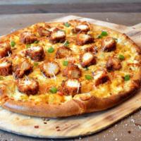 Nashville Hot Chicken Pizza · Nashville Hot Chicken tenders, mac and cheese, diced red peppers, green onions, mozzarella a...
