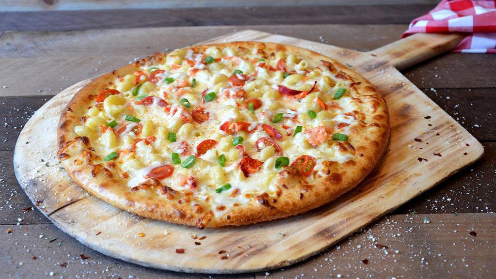 Lobster Mac Pizza · Lobster claw meat, white cheddar mac and cheese, pearl tomatoes, green onions, mozzarella cheese and white sauce.