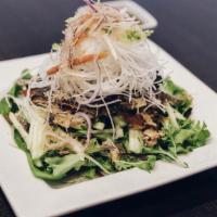 Salmon Skin Salad · Crispy Salmon Skin with Baby Mixed Greens. Served with House Ponzu & Sweet Mustard Dressing.