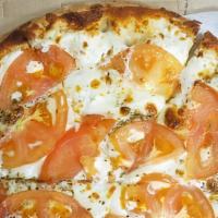 White Night Pizza · Mozzarella and Ricotta cheese, fresh tomatoes, garlic, and oregano.