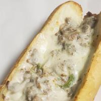 Philly Steak Sub · Thinly sliced steak, Mozzarella, fresh mushrooms, fresh green peppers and onions.