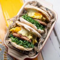 Stud Muffins Breakfast Sandwiches (2) · 2 english muffins with egg, cheddar, sausage patty, kale, jalapeno lime aioli
