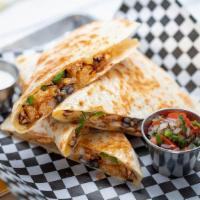 The Reaper - F'D Cajun Chicken Quesadilla · quesadilla filled with cajun chicken, waffle fries, beans, jalapeños,  jack cheese, served w...