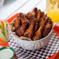 12 Pcs  All Natural Wings · all natural (no hormones or antibiotics)  chicken wings cooked to perfection. Choose your fa...