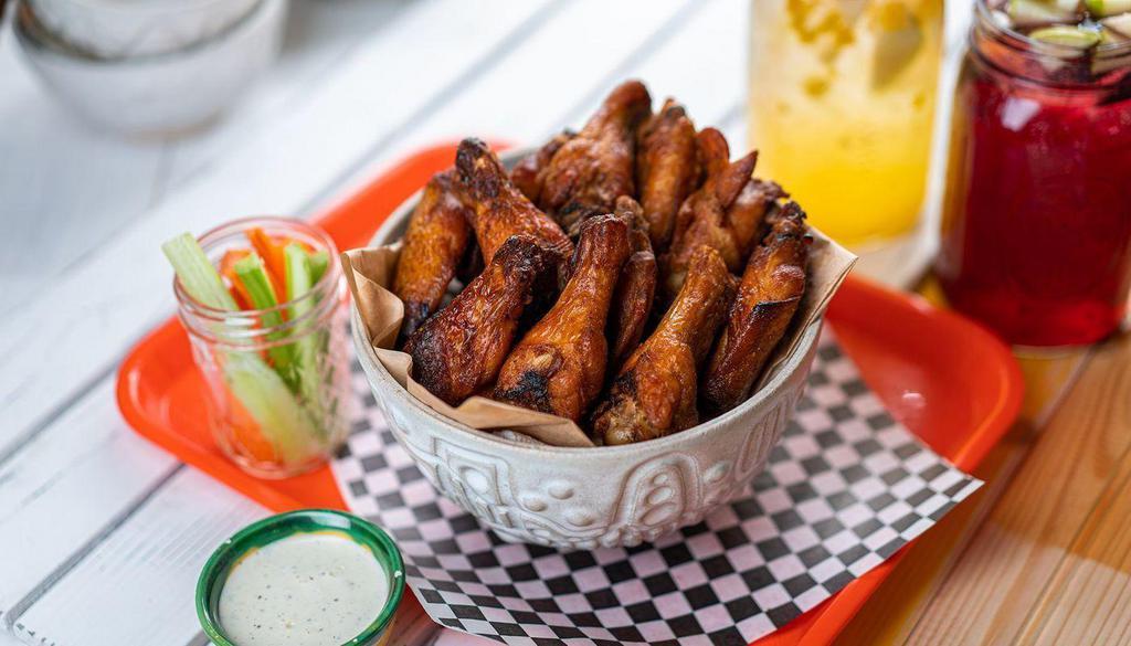 12 Pcs  All Natural Wings · all natural (no hormones or antibiotics)  chicken wings cooked to perfection. Choose your favorite flavor and dipping sauce.