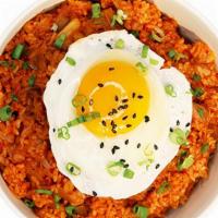 Kimchi Fried Rice · Stir chicken fried rice with vegetables and kimchi base.