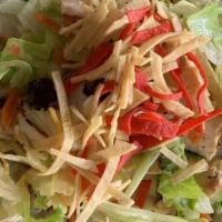 Bbq Chopped Salad · Mixed greens, sweet corn, tomato, cucumber, carrot, mixed cheese, and tortilla strips. Serve...