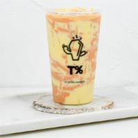 Thai Tea Tornado · Thai milk tea slush with creamy puff twist.