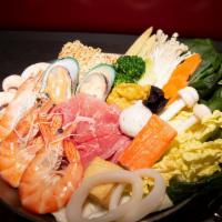 House Special Hot Pot · Beef, Shrimps, Fried wonton, Fish Tofu, fish Ball, Green Mussel, Squid White Tofu, Imitation...