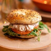 Chicken Salad Bagel Sandwich · tomato, arugula, lemon herb aioli, bagel, chicken salad