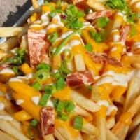 Loaded Cheeze Fries · Shoestring french fries covered in a our super delish creamy, homemade vegan cheese sauce, t...