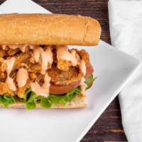 Oy! Po'Boy Sandwich · Battered and fried Oyster Mushrooms with fresh tomato, lettuce, dill pickle, vegan mayo and ...